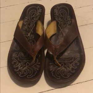 OluKai brown leather wedges size 6.
